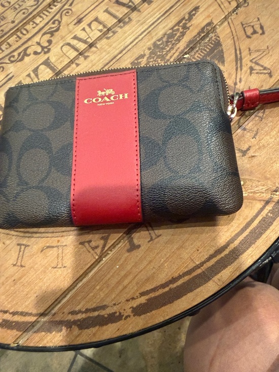 Coach Handbags - Coach Black Signature Wristlet with Red Center Stripe